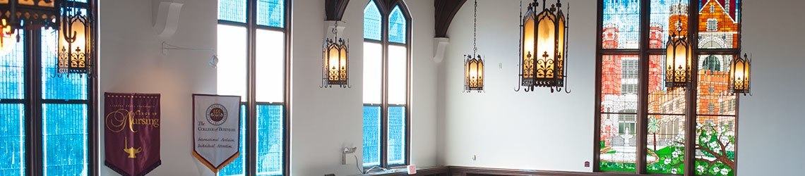 Photo of the stained glass windows inside of Dodd Hall