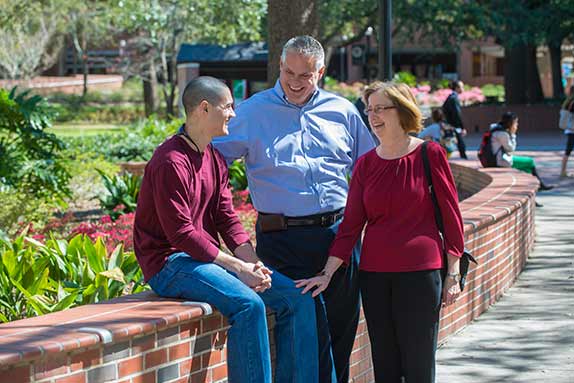 Photo of a family on the campus of Florida State University during Parents' Weekend